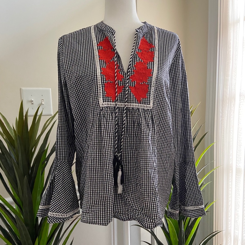 Checkered blouse with red embroidered flowers